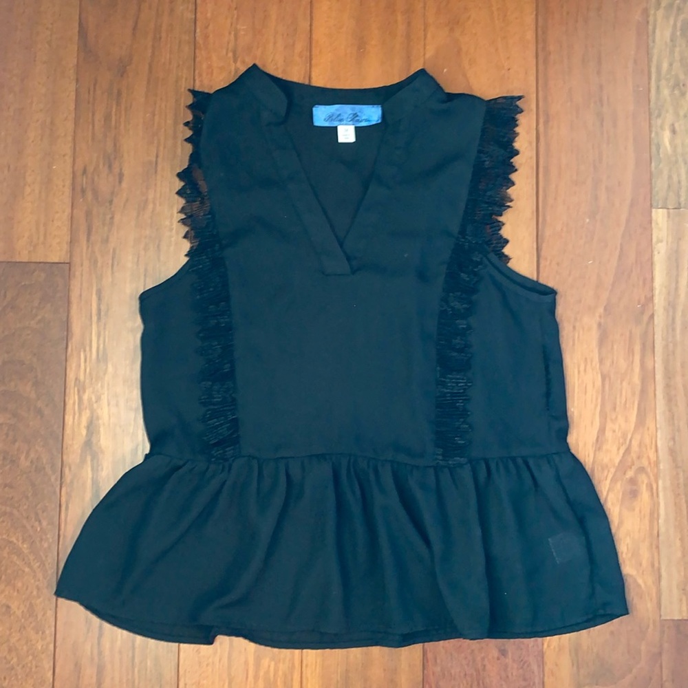 Francesca’s Sleeveless black blouse
